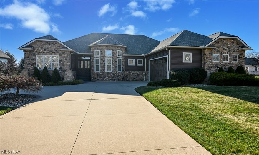 Welcome/Benvenuto to 2658 Macduff Dr. in Saint James Place. 3 Bedrooms, 3 1/2 Baths/2 full 2 car garage, a pool and a hot tub. It will take you seconds to fall in love with this fabulous ranch. Great home...Great condition....Great location. This gorgeous executive ranch features rustic roman modern facciata, style with brick stone. The garage has nature stone with stained glass windows.  The open floor plan highlights the kitchen granite countertops, soft close cabinets with a lovely dining room in the rotunda and spacious great room. A beautiful master suite with unique window view located next to a private office den and features a large master bath. The 2 additional bedrooms complimented but a unique Jack and Jill bath. GE appliances, AC 3 years. The home is surrounded with a speaker sound system. 15x35 fiberglass pool and hot tub. All new lighting fixtures and ceiling fans. A beautiful quartz fireplace wall to enjoy the winter nights. The lower level has a large HD video, projector system, kitchenette and half bath. The home has exceptional craftmanship and top quality materials throughout. This stunning home will not disappoint.