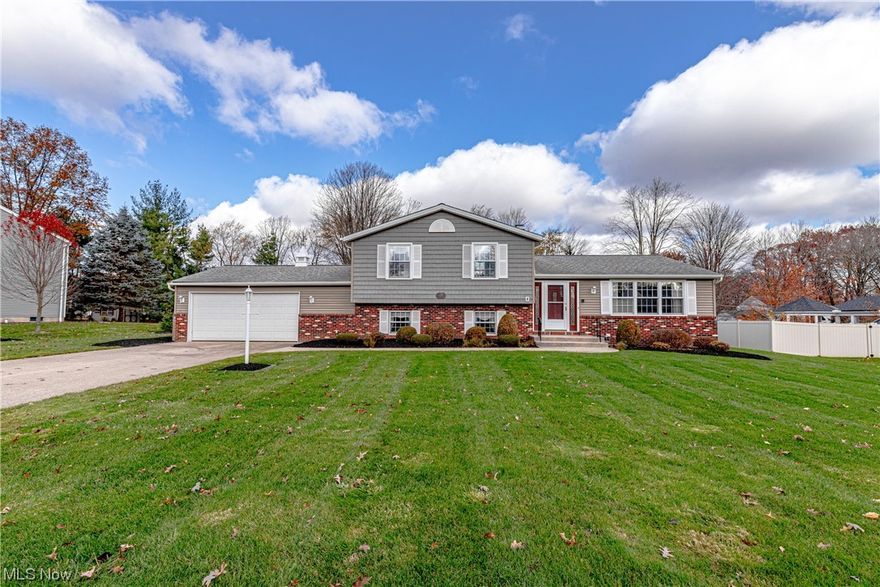 Beautiful three bedroom split level in Broadview Heights with Brecksville schools. Lovingly maintained and glistening clean inside and out! Stamped concrete walk leads you to front door and entry with hardwood floors in living room and dining room. Sliding glass doors lead you to the all season room that overlooks large backyard. There is a gazebo, a paver patio with decorative walls and a large shed with overhead door. Inside the family room has a stone fireplace and a rec area with the wet bar. The basement offers tons of storage and cabinets. Upstairs the master bedroom has a full bath in a large closet. Bedrooms two and three overlook the backyard. The garage is heated and has utility sink and cabinets for tidy storage. The landscape has been professionally maintained. The hot water tank was replaced in 2018. Call today to view this outstanding home!