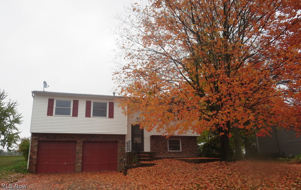Excellent opportunity to purchase this three bedroom home. The exterior offers concrete driveway, two car attached garage and rear deck off of the kitchen. The interior offers three bedrooms, two bathrooms and a large kitchen with eat in area. The lower level is of this home is also finished.