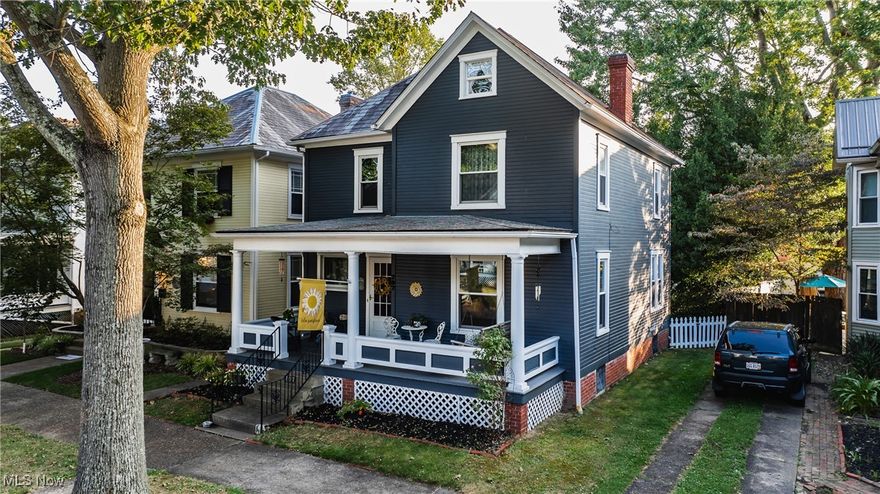 Timeless Elegance with Modern Comforts in this Beautiful 1900s Gem!

Discover the perfect blend of historic charm and modern convenience in this well-maintained 3 bedroom, 2 bath home, built in 1900. This one also features a finished attic space that could be a fourth bedroom The moment you enter, you’ll be captivated by the stunning original woodwork, which adds warmth and character to every room.

The living room features a cozy electric fireplace, perfect for relaxing after a long day. Adjacent is a large formal dining room, ideal for hosting family dinners or special occasions with plenty of space for entertaining.

This home has been thoughtfully upgraded with two HVAC systems and newer windows, ensuring comfort and efficiency all year round.

In the lower level, you'll find a versatile recreation room, offering additional space for hobbies, entertainment, or relaxation.

Enjoy the outdoors from the large front porch, complete with a charming porch swing, where you can savor peaceful moments with your morning coffee or unwind at the end of the day. The private backyard provides ample space for outdoor activities, gardening, or simply enjoying the fresh air.

Parking and storage are a breeze with the 2-car detached garage and alley access.

This move-in ready home offers the best of both worlds: historic character paired with modern amenities. Don’t miss the chance to own this beautiful gem!