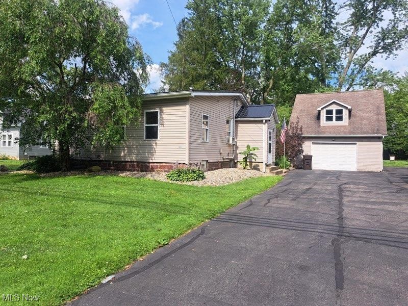 Very nice and well maintained 2 Bedroom Ranch / Large eat-in Kitchen with Stove & Refrigerator included / Main Bedroom with walk-in closet and access to a side Deck / Huge updated Bathroom with Laundry / Shower plus tub with jets / Full Basement / Oversize 2 car garage / Workshop area and loft in garage / All this on 1.08 park like acres