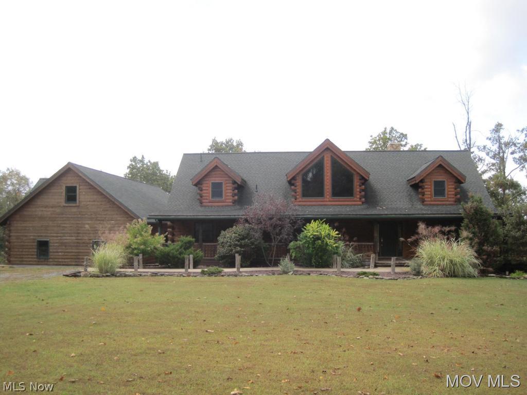 This amazing quality-built cedar log home nestled on 11.5 acres of privacy just minutes from town offers an open floor plan with hickory flooring. Relax on the full length front and back porches overlooking the woods. The great room with its massive stone fireplace is open to the kitchen with stainless steel appliances & convenient island with extended countertop. Master suite offers corner Jacuzzi, big shower and double bowl vanity. Spacious loft with full bath offers additional living space. New 2 level, 3 car garage/workshop with heat/air is a man's paradise. This is a "Must See"! M627 KL Elem: Warren Elementary School Elem/Bus: Y JrHigh: Warren Middle JrHigh/Bus: Y High: Warren High School High/Bus: Y Fire: VOL Police: SHF ;SQFT=Fin L1:1800, Fin L2:690, Fin Bsmt:0, Fin Above:2490, Fin Total:2490, Unfin Above:0;GAR= Gar Other-See Remarks
