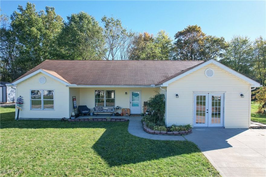 Welcome home to this charming 3-Bedroom, 2-Bath ranch available in a quiet, welcoming neighborhood. This single level gem has no stairs to climb and with oversized doors throughout the whole house making it very accessible. Tastefully updated with fresh paint, newer appliances and luxury vinyl plank flooring makes this home move-in ready. The open floor plan seamlessly blends functionality and cozy family living. Enjoy outdoor living in the expansive backyard- perfect for entertaining, gardening or simply relaxing on the deck. The fence around the back yard does not go around the whole property leaving room to extend the fence if needed. The Garage has been converted for extra storage space or use your creativity and turn it into your dream space. Don't miss out- book your showing today!