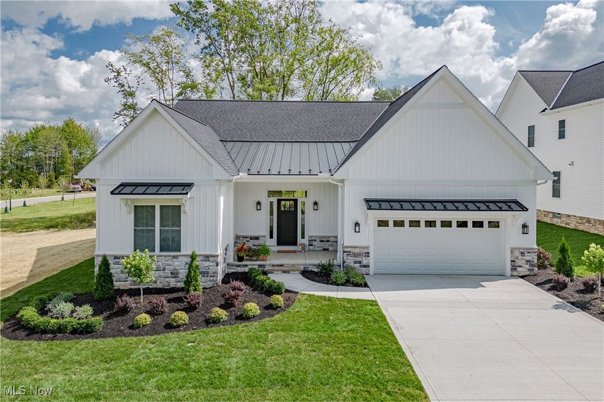 Welcome to the Mulberry ranch-style home in Montebello, a premier community in Mayfield Village! This beautifully completed home blends comfort, elegance, and thoughtful design—offering 2,150 square feet of open-concept living with 3 bedrooms, 2 full bathrooms, and abundant natural light throughout. This home is truly move-in ready. From the welcoming front entry, you’re greeted by refined architectural details including wainscoting, soffit and crown accents, and stunning painted beamed ceilings that extend through the kitchen, living room, and owner’s suite—creating warmth and character throughout the main living areas. The open layout seamlessly connects the living and dining spaces, making it ideal for both everyday living and entertaining. At the heart of the home, the gourmet kitchen features a spacious center island, upgraded countertops throughout the entire home, and a beautifully tiled backsplash with upgraded tile selections. The attention to detail continues into the bathrooms with a tiled owner’s bath floor and tiled powder room floor, delivering a cohesive and elevated finish. Privately tucked away, the owner’s suite offers a peaceful retreat with dual vanities, a walk-in shower, and a generous walk-in closet. Two additional bedrooms and a full hall bath provide flexibility for guests, family, or a home office. The full 9’ basement is already prepared for future expansion, with rough-ins beneath the concrete for a bathroom including a shower, toilet, and sink—making finishing the space simple and cost-effective. Additional upgrades include 12 recessed lights installed throughout the home, a garage with epoxy floor coating, and an in-ground sprinkler system with six zones for convenient lawn care. Enjoy serene suburban living just minutes from shopping, highway access, top-rated schools, and the scenic trails of North Chagrin Reservation. This exceptional home is complete, upgraded, and ready for its next owner—just move in and enjoy.