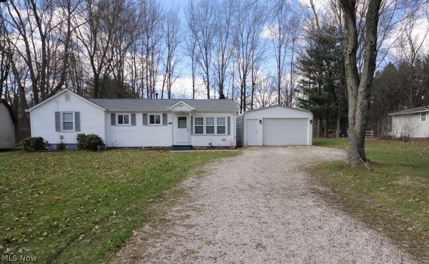 Well Cared for Home. Large Living room with Fireplace, Newer Garage,  Permastone floor in Sun Room, Laundry area, Move in Ready