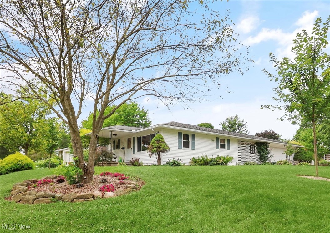 Welcome Home to this spacious 3-bedroom, 2-bath ranch that is perfectly situated on a generous corner lot in one of Wooster’s most established and sought-after neighborhoods, just minutes from parks, schools, and more! Step inside to discover a home that has been thoughtfully updated and has plenty of space for all! The completely remodeled kitchen (2021) features modern cabinetry, sleek countertops, and stainless steel appliances, making it the perfect space to cook and entertain. The main bathroom was also beautifully renovated in 2021, giving it a fresh, stylish feel. Major updates include a new furnace and A/C unit (2023), roof and windows (2015), hot water heater (2020), and a brand-new privacy fence (2025)—all the big-ticket items are done! Downstairs, you'll find a rec room, large laundry room that houses the other full bath, plenty of storage areas and a few more rooms that are just waiting for your personal touches. Step outside and enjoy your own private outdoor oasis featuring a 16' x 24' covered patio—perfect for relaxing, entertaining, or dining al fresco. The fenced-in backyard provides plenty of space for pets, play, and gardening. Don’t wait—this one won’t last long! Call today to schedule your private showing!