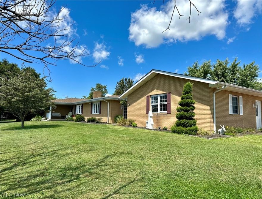 This beautiful brick ranch is a rare listing with over 2000 sq ft of updated living space & sitting perched upon a picturesque 23.99 acres of land. You'll be impressed as you approach the pine tree lined drive to your own personal getaway! Outdoor living is appreciated here! Your active family will love spending days by the pool, playing on the custom built playscape and the outdoor firepit. Looking for some serenity? You will cherish lounging by the large koi pond, Pergola breezeway and the private outdoor flower gardens. Inside you will find 3 bedrooms (with the possibility of a 4th if you need it), 3 family rooms with fireplaces and a 30-foot kitchen with endless countryside views. The land is a nice mix of approximately 8 acres mowed and the rest wooded with cleared trails perfect for recreational vehicles, hunting, horses, or whatever your heart desires. Per sellers there is a stream that runs through the property and there is also a water tap in the upper field. The sellers enjoyed horses, goats and chickens on the property for many years so there are several outbuildings still in place. The barn is old and will need to be torn down, but there is plenty of space to build your own dream barn. Drone photography coming soon. Minerals are leased and do not convey. Please do not enter private driveway without an appointment.