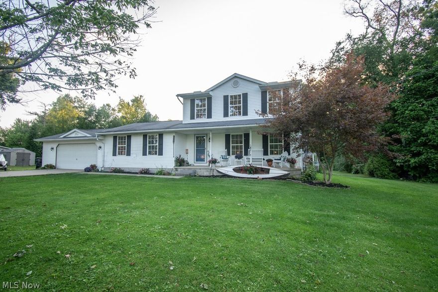 Welcome to the lake!! This immaculate 4 bedroom, 2 1/2 bathroom home offers an updated kitchen equipped with stainless steel appliances, first floor laundry room and first floor master bedroom with en-suite! Updated bathrooms and carpet in Master bedroom. New reverse osmosis water system. A  bump-out garage with heat and electric to store your boat in the off season! Along with a large double lot private back yard. You do not want to miss your opportunity to make this home your own!