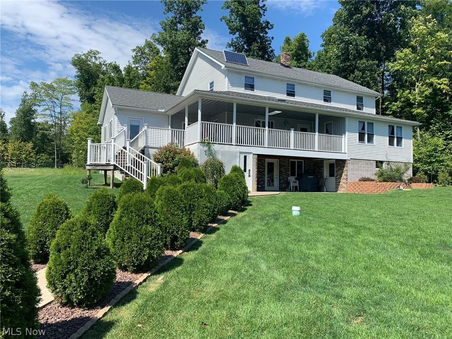 Beautiful country colonial made to house a large family or someone who needs to spread out.  The kitchen has custom hickory cabinets, the dining room has barn door style cupboard and is open to the kitchen.   The home is not traditional and needs a furnace.  The basement is a walk-out.  You'll love the 20.51 acres which has a lot of fenced pastures and water is available for each pasture.  The barn has 11 box stalls with automatic water, 2 tie stalls, wash room, walkway and 2 ton grain bin.  Tack room and plenty of storage for 1500 bales of hay.  Shop is 30x50, heated with water and spray foam insulation.  There are 3 solar panels.  This property is awesome and is ready for new owners!