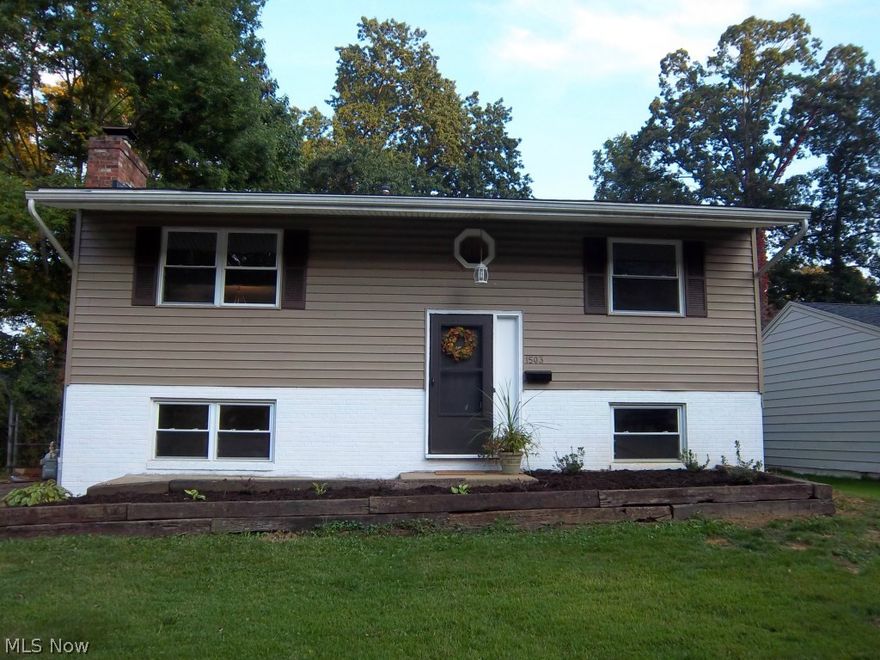 Beautifully remodeled home just across the street from Sand Run Metro Park. On the main floor you have beautiful refinished hardwood floors and updated kitchen with new Whirlpool stainless steel Whirlpool Appliances (2014) including Refrigerator, range, and microwave.  Walk-out Lower level includes beautiful fireplace, new carpet (2014) and updated bathroom (2014) with new vanity, mirror, flooring and tile shower door. New mechanicals (2014) include A/C, furnace, hot water tank, and updated electric service. The interior of this home has been painted a lovely bright neutral color and is in move-in condition. The new large deck (2014) off the kitchen is great for those summer evenings when you want to relax, enjoy the park system or entertain friends. Make this beautiful home yours and schedule a tour today! Better than renting!!