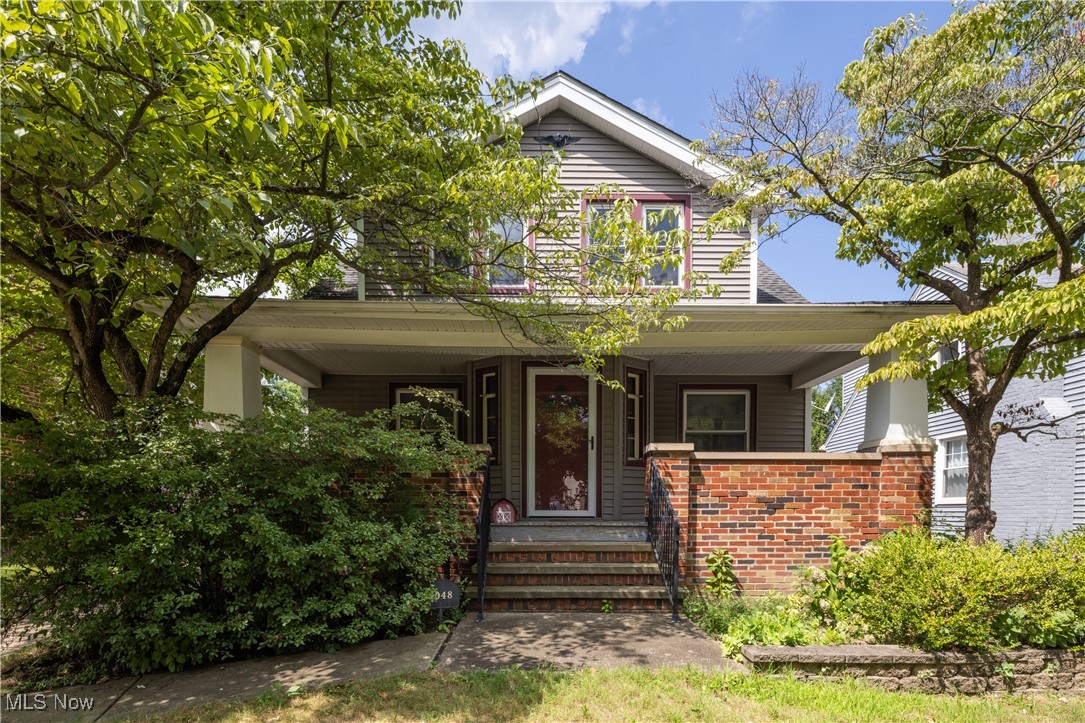 Welcome to 1048 Oxford Road in Cleveland Heights! This charming cape cod home has been lovingly cared for by the same owner for over 50 years. A true gem in the neighborhood, this home received a large scale makeover in 2014 including the replacement / updating of the following "big ticket" items such as the roof (home and garage), vinyl siding (home and garage), installation of vinyl replacement windows, HVAC units and a full kitchen remodel. The kitchen offers custom amish built cabinets and a garden window above the sink to grow herbs. Meticulously refinished wood work runs throughout the home as a shining example of how much attention to detail the property was given over the years. Discover the maintained classic century home character in the crown molding, restored trim and built-in dining room cabinets. Other highlights include a convenient main floor bedroom and half bath, full bath and two additional bedrooms on the second floor and a large full basement for mechanicals, laundry and storage. Enjoy the outdoors from the spacious front porch and private back balcony overlooking the fully fenced in yard. Conveniently located within a 10-15 minute car ride to University Circle, Cleveland Clinic, Case Western Reserve University, John Carroll University, Coventry, Little Italy and more!