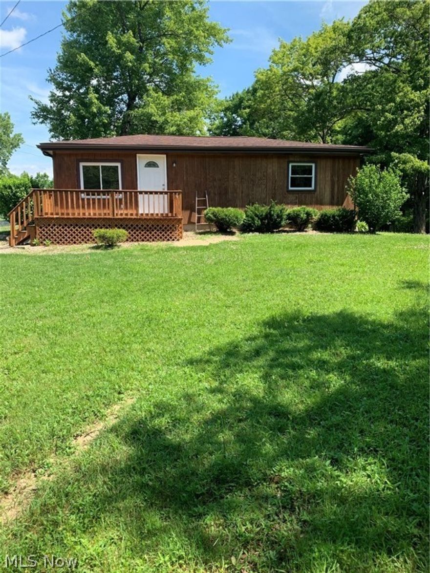 Great investment! Newly Updated Ranch style home on 2.6 acres. Live in one side and rent the other out to pay your mortgage! Converted into a duplex but can be turned back into a single-family. New flooring and carpet with many updates throughout. An abundance of blueberries and trees with wildlife. Appliances included. Nice deck on the front and the back of the home. Septic is about 4 years old and has a passing report from Trumbull county health. Easy to show, call today.