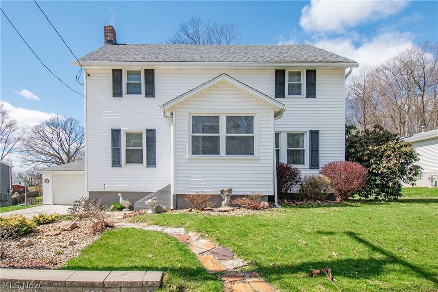 Welcome home to this spacious 5-bedroom, 2.5-bath colonial tucked away on a quiet street, blending comfort, function, and outdoor charm. A first-floor bedroom offers flexible space for guests, an office, or multigenerational living. The main level features an open layout where the living room flows seamlessly into the bright dining area and kitchen, perfect for everyday living and entertaining. The finished basement rec room adds even more space for game nights, a media room, or the ultimate man cave. Outside, enjoy the covered back porch (2020) and a deck overlooking the beautiful creek that makes this backyard truly special. The outdoor space also includes lovely landscaping, a storage shed (2017), and a workshop with electricity (2023). Major updates include the house and garage roofs (2019), concrete driveway (2021), and new carpet (2021). This home offers the perfect mix of space, updates, and a peaceful backyard retreat, schedule your showing today!