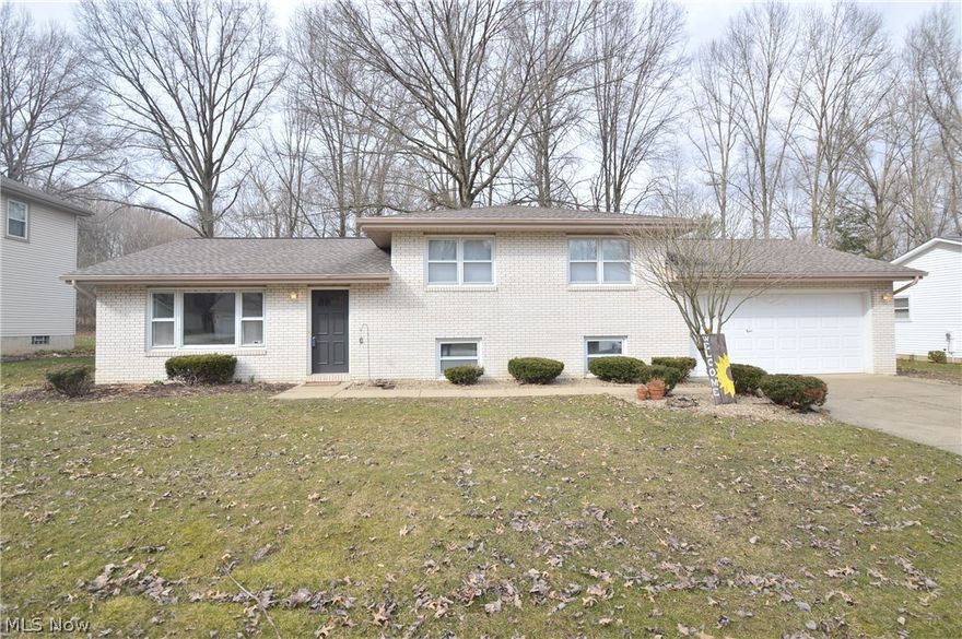 Nicely updated 3 bedroom, 1.5 bath home in Canfield School District. This home offers newly remodeled kitchen and bathroom and all new outside drain tiles and downspout lines.  Wooded lot in quiet neighborhood, this home is close to Mill Creek Park and conveniently located near fine dining and shopping.  2 car attached garage, private rear yard and 3 season sunroom add to the charm of this wonderful home.