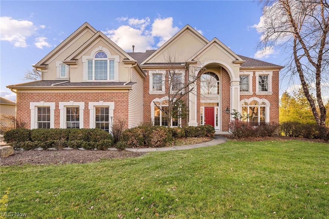 East-facing, brick and stucco colonial, custom-built as Parkview Homes' model. Highlights include: 2-story foyer & great room, dual staircases, private den, finished walkout basement, 3-car side-entry garage, NEW ROOF. Work from home in luxury! Your executive den is enhanced by glass-paned doors, floor-to-ceiling windows, and rich wood built-ins and coffered ceiling. An entertainer's delight, spacious principal rooms easily accommodate all your guests during gatherings. Formal dining and living rooms w stacked crown moulding. The kitchen offers an elongated center island w breakfast bar, ample storage and workspace for culinary endeavors, pantry, and oversized dining area that can fit a dining-room-sized table! Absolute wow-factor great room boasts 18' ceilings, a wet bar, built-in shelves, a floor-to-ceiling wood-faced gas fireplace, & wall of windows overlooking the horizon’s spectacular sunsets! Off-white tile floors throughout this level, except for carpeted den, great room, and formals. Garage enters to laundry room w large closet and built-in sink. Upstairs, your deluxe owner’s suite includes 12' vaulted ceilings, a sitting room, dual walk-in closets, & a large vaulted bathroom w a double window, dual sinks, corner tub, walk-in shower, & enclosed commode. Three sizable guest bedrooms w walk-in closets and 10.5' vaulted ceilings–2 bedrooms adjoin a dual sink bath; guest suite has private bath. Your finished walkout basement is ready for entertaining–complete w a full bath, a room that may be used as an office/bedroom/craft room, large storage area w egress window, & living area w large wet bar, windows, and slider to the backyard w patio & stairs up to the elevated deck off the dinette. Lightly treed .38-acre lot has space for playset & garden. Furnace/AC replaced 2017. Major highways accessible in 9-14 min; Metroparks 8 min; SouthPark Mall 12 min. SOLD AS IS! Refresh this home w your desired updates. Inquire about including costs for updating in your mortgage.