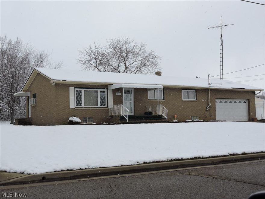 All brick Ranch home in Plain School District.  12 x 7 Covered front porch.   Front Living room with stone Accent wall.  Tiled front entry extends all the way to the kitchen. Open Kitchen (all appliances can remain) /Dining area with sliding door to a 14 x 16 Roof covered patio.  Completing the main floor are 3 BR w/ generous closets and Main bath with counter space.  The basement level has a finished 44 x 12 Family room.  Half stone accent wall, built in cabinets & countertop used for a "Snack" kitchen.  10 x 6 storage shelf area (under front porch).  Back basement unfinished Laundry area (washer/Dryer can remain) with extra cabinets & countertops.  2nd full bath (Stand up shower) and way back all utilities and storage area.  Updates: replacement windows, steel doors including Overhead garage door, roof, HWT, furnace, glass block in basement, all appliances, and more.  Call to preview this home TODAY, easy to show.