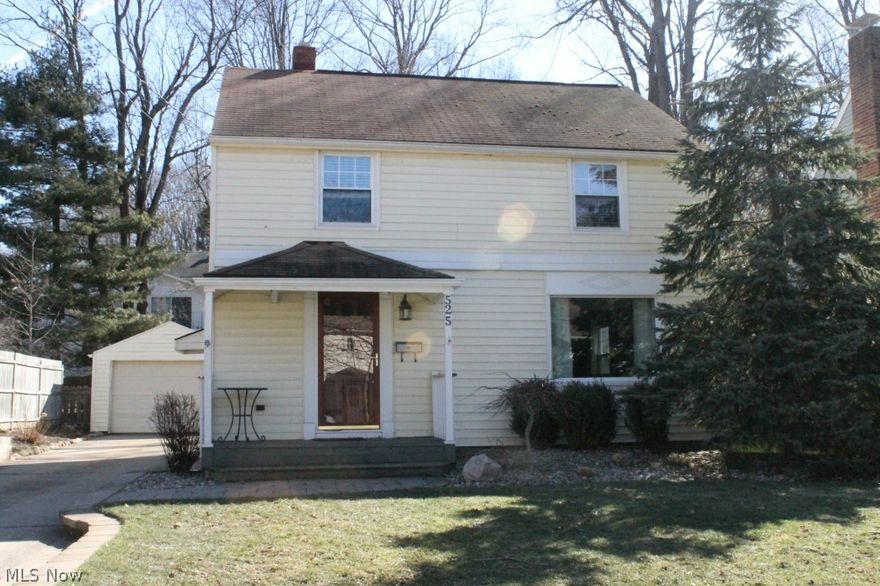 Close to downtown Kent and KSU, "Cozy" & "Comfortable" come to mind as soon as you experience the openness of this 1946 3-Bed, 2-Bath home that boasts newer family room addition with French doors to deck and partially fenced back yard.  Experience the richness of trending paint palette, original hardwood and woodwork, built-in twin china cupboards, glass doorknobs & updated baths and kitchen, all w/ ceramic (floors, shower, & mosaic backsplash). Carpeting is new in Family room, 2 of 3 bedrooms, stairs and upper hall(2013). Third bedroom boasts hardwood & other 2 have original wood under carpet. Newer windows(2014) throughout creates energy savings as well as ease of cleaning. Owner put in new retaining wall, stamped concrete patio, new A/C(2012). Downspouts & drainage in yard(2013). Full Improvements list at property or from MLS. With all of this and 1-year home warranty paid by seller for buyer, "cozy" & "comfortable" just took on new meaning! You won't want to miss out on the wonderf