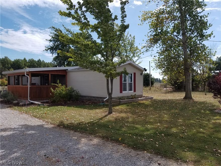 A fantastic well kept newer home on 2.6  scenic acres with a 24x30 garage with a great workshop a must to see . The house has been all remodeled with all new carpet,updated bathrooms,new paint throughout  and all new appliances . There is a real nice 12x18 screened in porch that is a perfect place to relax after a long day. This property is located in a very nice area of well kept homes . This house shows like new a must see property.