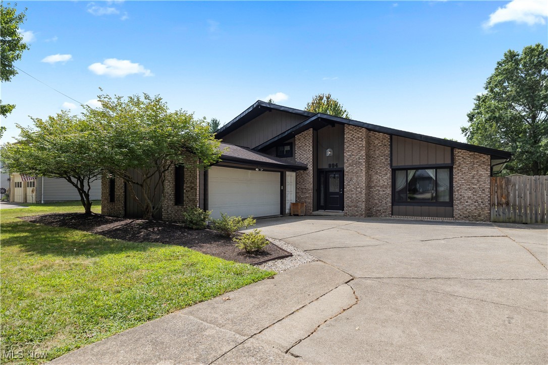 Welcome to this beautifully updated 4-bedroom, 2.5-bath split-level home in the heart of Medina. With over 2,000 sq. ft. of living space and situated on a .276-acre lot, this move-in ready residence combines modern updates with timeless comfort. Nearly every detail has been refreshed: new roof, siding, windows, gutters, flashing, interior and exterior doors, garage door with opener and springs, plus fresh paint throughout. Inside, enjoy new flooring across the main living areas, renovated bathrooms, updated lighting, switches, outlets, trim, and vents. The spacious kitchen includes newer stainless appliances that stay, along with a bright and functional layout. A dramatic great room with vaulted ceilings, exposed beam, and brick accents offers the perfect setting for entertaining, while the lower-level family room with fireplace adds cozy charm. Upstairs, generously sized bedrooms feature updated finishes and carpeting. The primary suite includes a renovated bath, with only the vanity countertop awaiting your personal touch and including a walk in closet. Outdoors, a fenced backyard with a 6? privacy fence, storage shed, and patio space create a private retreat. Mechanical systems are worry-free with newer AC, furnace, and hot water tank. Ideally located close to I-71, shopping, dining, and schools, this meticulously maintained property is ready for its next chapter.