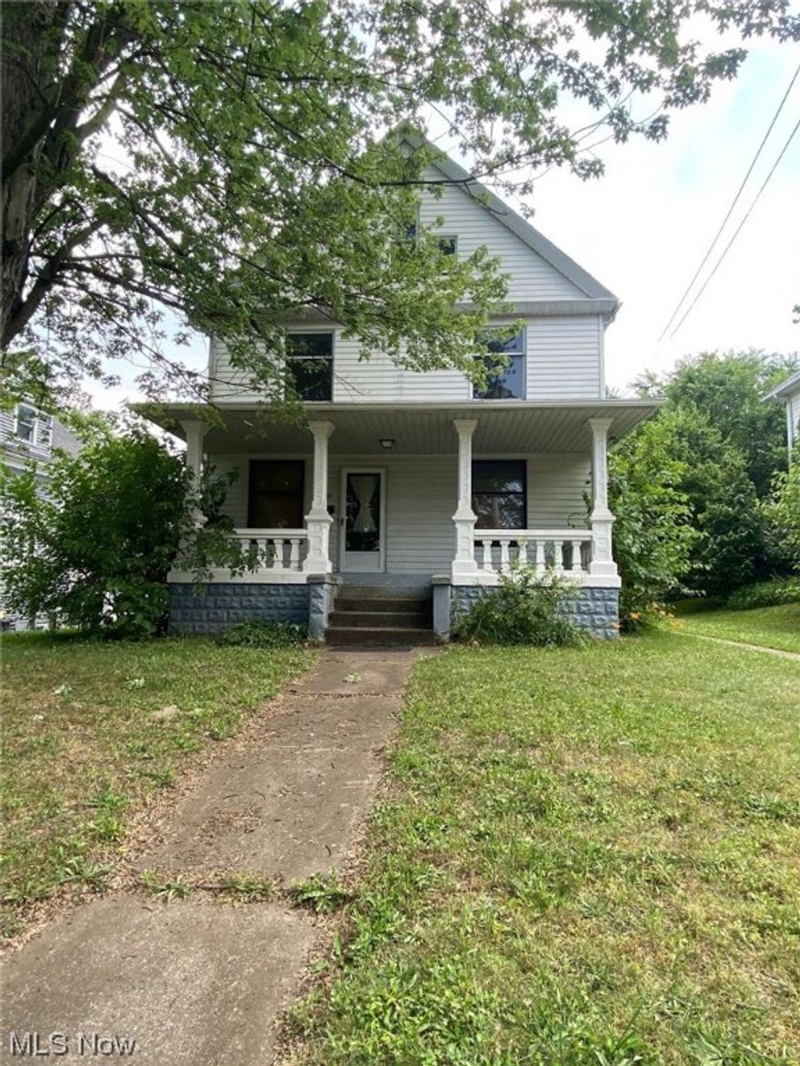 Charming home with detailed woodwork and 9' ceilings (on first floor) is waiting for you. The kitchen has plenty of cabinets for storage, gas range and direct access to the backyard. The formal dining room has a nice windows with cascading sunlight and leads to the great room with a formal fireplace. Custom rugs throughout first floor. Upstairs are three bedrooms and full bathroom. Full bath has been updated and features a walk-in shower, built-in tub and pedestal sink. The attic provides extra bonus space for storage, office, or anything you can envision there. The front porch is nice for warm summer evenings.