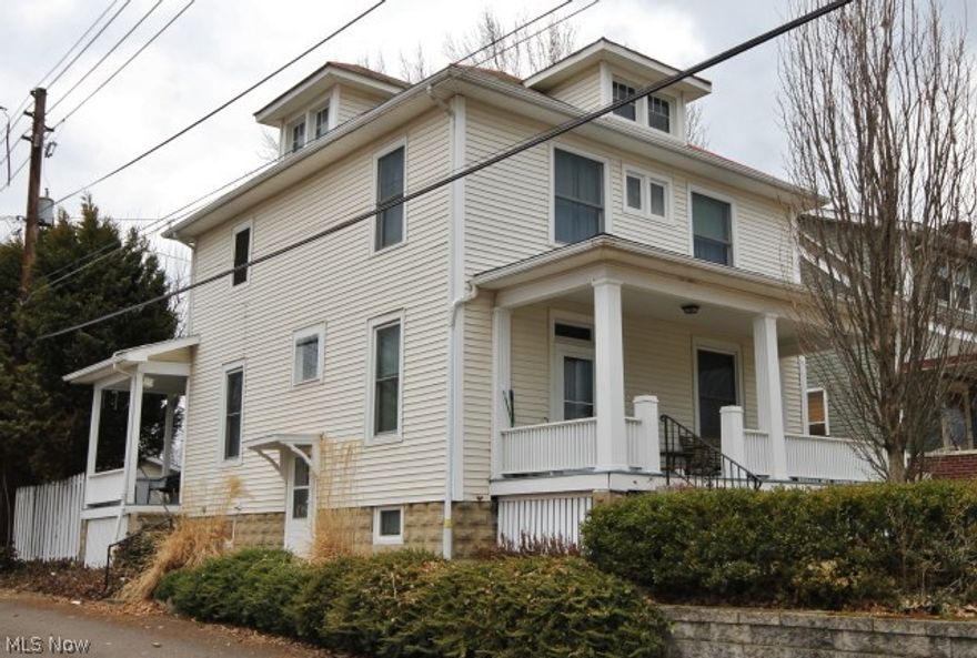 Very Charming Home with lots of updates but still has all the pretty old amenities:Oak doors and woodwork,leaded glass window in hallway. The kitchen has newer cabinets and flooring, all appliances stay.The sitting room off kitchen has a great view of backyard for you to enjoy those lazy mornings drinking coffee and watching the birds. Very cute new half bath off this area too.Newer replacement windows in downstairs and basement.The 24x24 garage is a real bonus.The 3 upstairs bedrooms and 2 full baths have nice closets and extra storage. One bath has a re-done claw foot bathtub.Plus shower bath . This home also has entrance foyer with big oak doors with more closet storage.The yard has been professionally landscaped  and spring is ready to bloom.The dining room is a good size to accommodate that big dining room table and china cupboard for your family meals and gatherings. The utilities are very reasonable and has had foam insulation added. Call me today to view this well priced home.