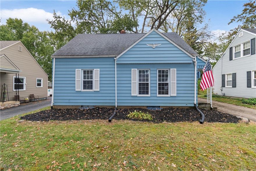 Cute, clean and affordable cape cod in Cuyahoga Falls! Detached one car garage recently leveled with new garage door. This 3 bedroom 1 bath home is ready for you to move in and call your new home! Brand new carpeting throughout with hardwood underneath. Freshly painted. New light and window fixtures. Eat-in kitchen includes stove, refrigerator and dishwasher. Two bedrooms on the main floor. Full bathroom with new tub surround. Spacious third bedroom on second level with natural woodwork and built-ins. Partially finished basement with two finished spaces. Furnace and hot water tank inspected and cleaned to ensure in top condition. Nice front curb appeal and enjoyable back patio area. Great location!