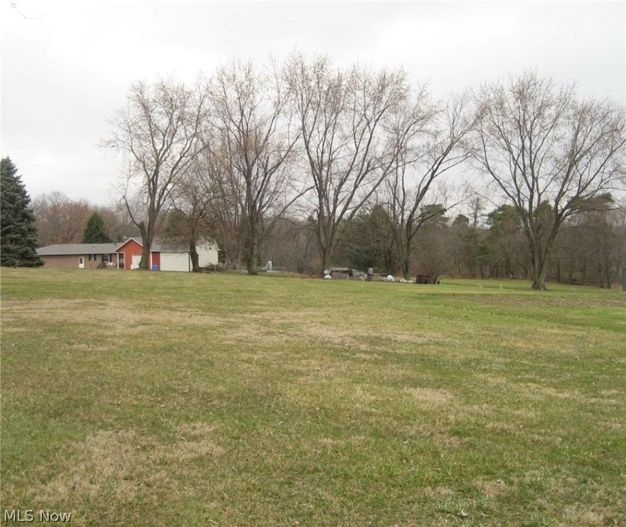Build your dream home on this 1/2 acre lot.  Enjoy the country location with city utilities available for tap in.
Only 10 min. to I-76/Rt.224, 15 min. to I-71.



** If you prefer not to build new, please view the adjacent 1 acre parcel MLS #3788852, which includes a 1774 sq. ft. brick ranch home.