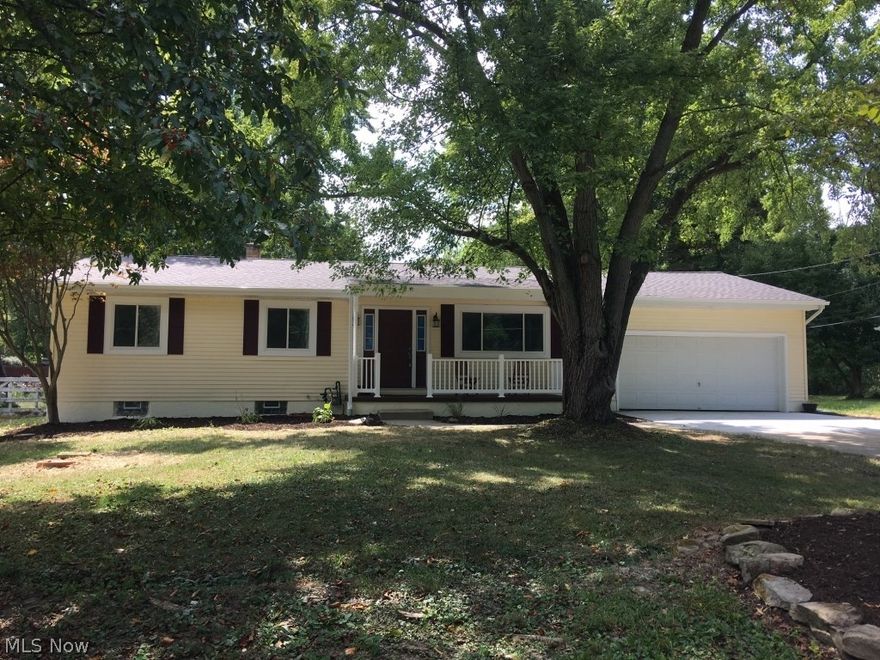 Welcome Home. Beautiful updated 3 plus bed, 2 bath home in Copley Fairlawn Schools. New roof, furnace/AC, seamless gutters, (most) vinyl windows, and hot water tank. Completely updated interior with upgraded electrical, tile bathrooms/showers, kitchen cabinets and butcher block counters, subway tile backsplash, and stainless appliances. Laminate flooring, new carpet, new trim/doors and fresh paint throughout. Half acre lot with oversized 2 car garage and covered patios. Large portion of basement finished!