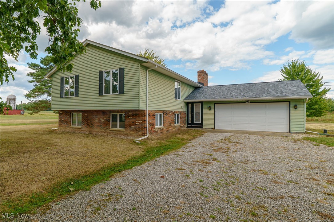 Welcome to 6747 Giddings Road in Rootstown! Nestled on 11.3 acres, this property offers the perfect balance of comfort, functionality, and endless possibilities. The well constructed home features 3 spacious bedrooms and 2 full bathrooms, providing a warm and inviting space for everyday living. The bright and open kitchen flows easily into the dining and living areas, ideal for both entertaining and quiet nights at home. There are plenty of windows allowing full light and views of the expansive property. The living room and recreation room have wood burning fireplaces.
A two-car attached garage adds convenience, while the impressive 30 x 50 pole barn expands the property’s potential. Whether you envision a workshop, storage for equipment and vehicles, or space for hobbies and projects, the pole barn is ready to accommodate your needs.
Outdoors, the 11.3 acres offer incredible opportunities—whether it’s creating trails, gardening, farming, keeping animals, or simply enjoying the privacy and natural surroundings. With ample space and flexibility, this property is perfect for anyone seeking country living with room to grow.
Recent updates include NEW ROOFS on home and pole barn in 2024, new gutters, new soffits, all new doors in entire home and new wrought iron railings on inside steps. Older updates include hall bathroom, LVT flooring on upper level, boiler recently serviced, new chimney completely rebuilt, newer electrical, newer water heater and updated sump pumps. Also added were "Leaf Guard protectors" on gutters with lifetime warranty.
Don’t miss your chance to make this unique property your own—schedule a private tour today!