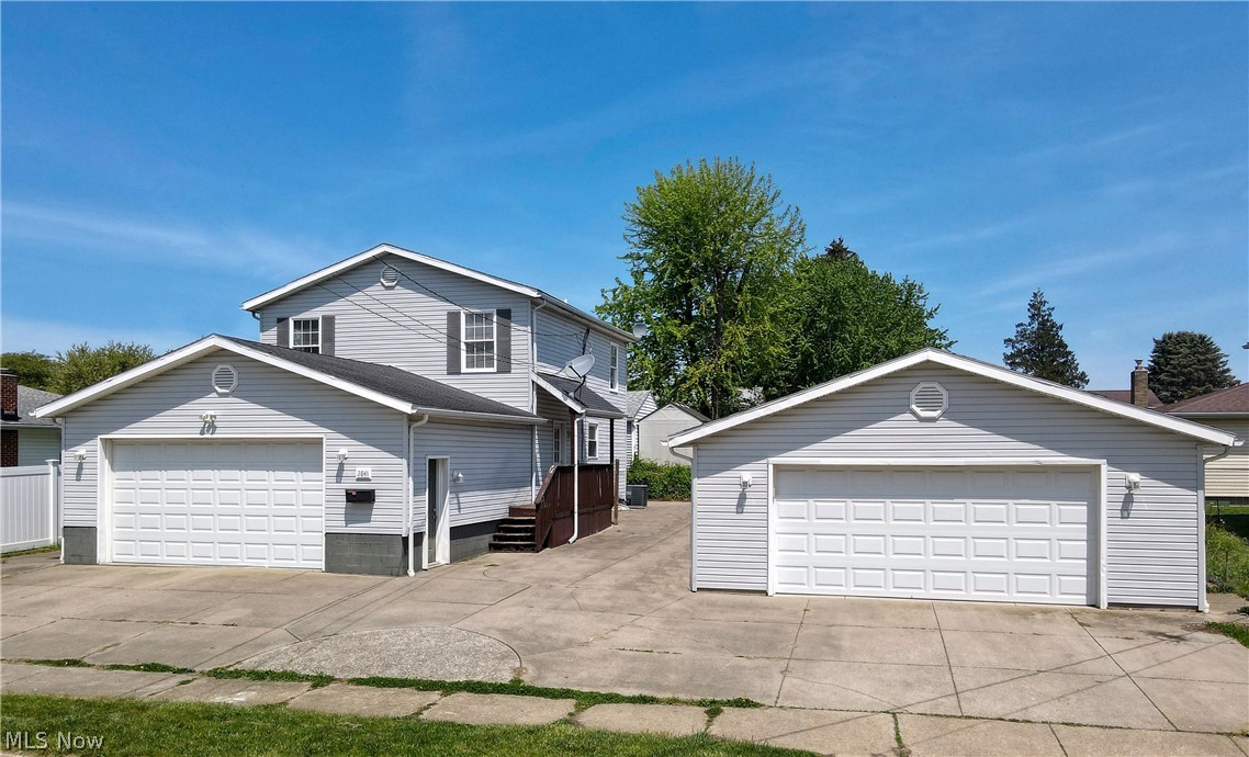 Great home in Ellet! This updated home is waiting for its new owners. Open floor plan from updated kitchen with white cabinets and stainless steel appliances to the large living room with dining area. Sliding doors lead out to the back patio space. A full updated bathroom and mudroom complete the first floor. Upstairs you'll find a second floor laundry area, three large bedrooms and another updated full bathroom. The basement is finished and has a half bathroom. There is an attached 2 car garage PLUS a detached oversized 2 car garage!! Fenced in yard is great for pets or kids. HVAC-2015, Electrical/plumbing- 2017, Electric water heater- 2020.