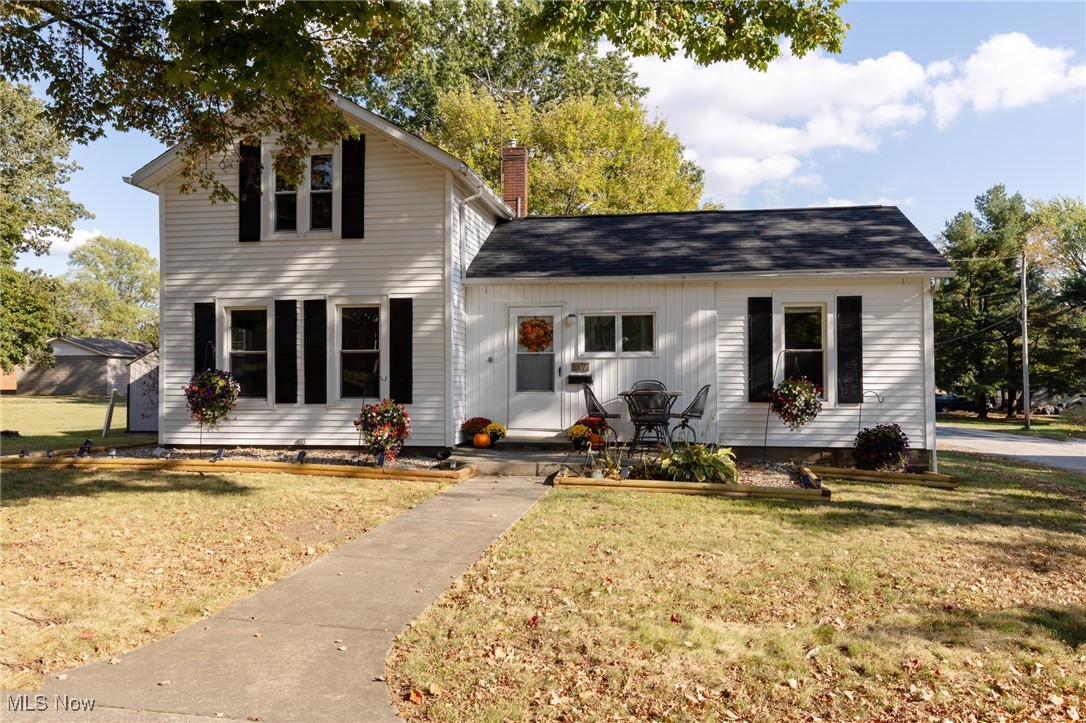 BRAND NEW ROOF!! Built to last in 1890, this home has been loved, remodeled and cared for - for over 135 years! Having loved, but outgrown the space, the current owners had a new roof installed in Sept '25, and are ready to hand it over to it's new owners. This 2-bed, 1.5 bath colonial is nestled near the heart of Doylestown, with streetlights and sidewalks, just a block from Memorial Park. The park has a playground, tennis and basketball courts, a baseball field and a rentable pavilion. As you step into the home, you will enter the open-concept, living room and eat-in kitchen. The appliances are all newer, the storage is ample and there is a TON of counter space! Open shelving offers more options for storage or showcasing your favorite things! There is a first floor bedroom - currently being used as an office/music room - and a full bath with a shower/tub combo around the corner. Upstairs, you'll find another bedroom, a half bath and a loft area with built-in bookshelves for reading and enough room for a couch/sleeper sofa for overnight guests, if needed. The basement isn't "finished", but there are areas that are cozy, functional and usable. Outside, you'll find TWO out-buildings: a Lifetime shed that is 8' x 20' (with electric) and an 8' x 12' wooden shed for additional storage. There is also a lovely garden area with it's own water source and while there is no garage, there is a concrete pad that parks 3 cars!! The yard is fenced in nearly all the way around (except for the back corner) and the sellers are also offering a 1yr Home Warranty. Easy highway access to SR21, close to schools, local restaurants and the chance to live in a lovely, quaint little village. What's not to love? This home has everything you need as you get started in life or get a NEW start on life. Come and check it out yourself! Call your favorite Realtor and shedule an appt today!!