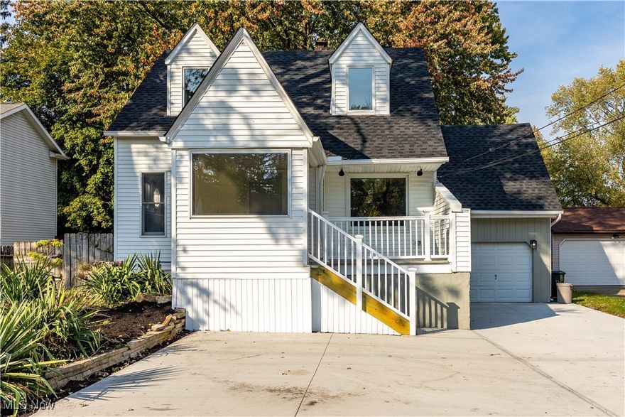 Welcome to this beautifully updated 3 bedroom, 2.5 bathroom Cape Cod style home that could easily be converted to a 2-bedroom house with an in-law suite.  The property is located in a quiet neighborhood within the Westlake City School District. This home nicely blends classic charm with modern updates, offering comfort and style with a lot of natural light! Inside the home, you will find brand new flooring throughout. The completely renovated kitchen features new cabinetry, countertops, and appliances, plus a convenient look-through to the living room, perfect for entertaining and gives more of an open feel. The dining room is located just off the kitchen for easy gatherings. The main bathroom has been totally remodeled, complete with a new vanity. The house has been freshly painted throughout as well. The partially finished basement offers extra living space or can be used for a recreation room, with a sliding door separating the finished area from the storage space plus new paint for a fresh, clean feel. Outside, enjoy the refinished front porch with room for seating and newly built steps leading down to the brand-new driveway. You can also enjoy sitting out back on your partially covered, freshly painted deck! The roof and gutters are brand new so the big ticket items are done for you! This home is move-in ready, perfect for first-time buyers or anyone looking for space to grow.