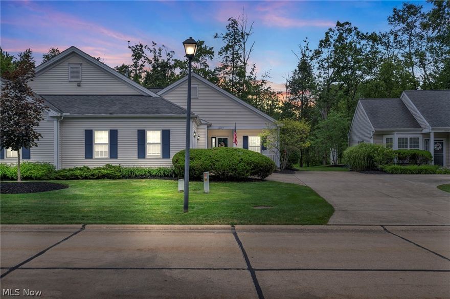 Your beautiful new home is waiting for you in the sought after Crossings at Pond Brook.  This stunning home has just been freshly painted and is waiting for its new owner.  Coming up to the home you will see a cute front porch and as you walk into this home you will see an open floorplan with gorgeous wood flooring.  The living room features a gas fireplace as well as a ceiling fan.  This home has a coveted 4 season sunroom/family room which features a ceiling fan and a wall of windows.  The dining room has sliders to the back patio which overlooks a pond and woods.  Back inside, the kitchen features a stainless-steel appliance package which features a brand-new Refrigerator, uplighting on the cabinets, a nice sized breakfast bar, and a walk-in pantry.  Down the hall to the attached garage, you will find the 2nd bedroom with ceiling fan and a walk-in closet, a full guest bath, a laundry room with washer/dryer, and a nice sized closet.  On the other side of the home is the nicely sized Primary bedroom with full bath, walk-in closet, and ceiling fan.  Additionally, the garage has a pull-down attic with flooring, storage shelves (which stay), and a ceiling fan.  The yard has a sprinkler system.  As you view this home, please note that all appliances stay with home if the Buyer wants them, as well as all the furnishings in the home, on the porch and patio are available for sale.  Make time to see this one today!  Seller is motivated.