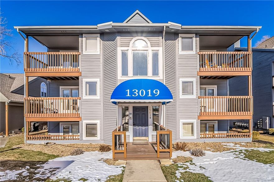 This is the lakefront condo you’ve been waiting for! Just minutes from the charming, historic downtown Vermilion, this unit offers spacious living both inside and out. As soon as you enter, you’ll be greeted by breathtaking lake views that stretch across the open-concept living area. Inside, you'll find stylish updates throughout, including luxury vinyl plank flooring, a stunning fireplace wall tiled with custom built-in cabinetry and shelving, sleek stainless steel kitchen appliances, HVAC equipment, hot water tank and washer/dryer all replaced in 2020/21. A large sliding door at the end of the living space opens to an expansive covered porch, providing the perfect spot to relax and take in views of your private beach and the lake beyond. It’s an ideal place for outdoor dining, enjoying sunsets, or simply unwinding. The master bedroom features a serene wake-up call, with a wall of windows offering panoramic lake views and a door leading directly to the porch. The second bedroom, also versatile as an office, includes its own balcony – a peaceful retreat to soak up the sun while enjoying the cool lake breeze. The guest bath across the hall also houses the in-suite laundry for convenience. Step outside and descend the short staircase to your private beach, where you can indulge in quiet, beachside moments, shared only with five other neighbors. This beach space offers endless opportunities for relaxation or recreation, right in your own backyard. And with the Association having already invested in a new seawall at the base of the stairs, you can enjoy this rare lakeside retreat with peace of mind. Don't miss the opportunity to own this incredible lakefront getaway!