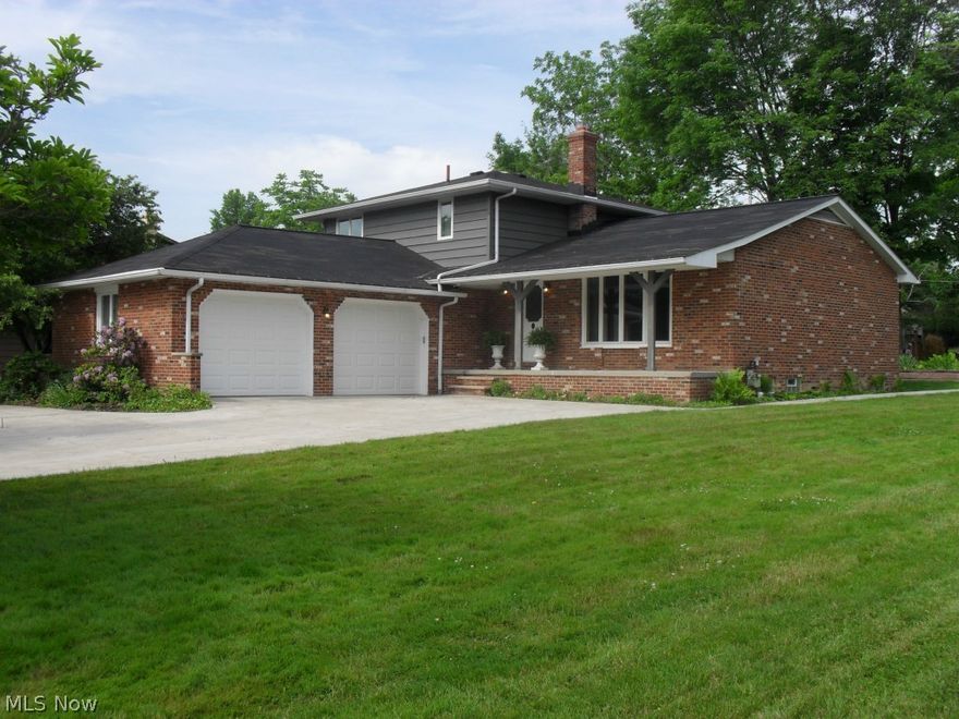 Rare opportunity to own a terrific home in high demand Briarwood Estates. $50,000+ in recent updates include large concrete circular drive, concrete walkway & patio, Anderson windows, roof, furnace & AC, HWT, basement waterproofing, updated baths, carpeting & flooring. Freshly painted interior. Spacious kitchen open to step down family room which features a full wall brick fireplace and slider to covered patio. Private covered patio with natural gas grill is perfect for entertaining and cooking out. Gorgeous solid wood doors throughout. Slate flooring in foyer & hall. First floor bedroom or office. Oversize 2 car garage with newer insulated doors. Large rec room with dry bar. This home is in spotless turn key condition. Brecksville Schools! Hurry!