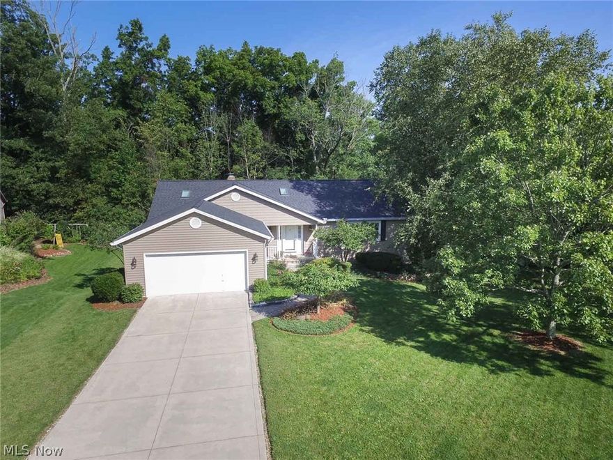 Meticulously maintained Ranch in Revere Schools.  This 3 bed, 2 bath ranch has a new roof, new siding, new windows, and new concrete driveway.  The vaulted ceiling Great room with skylights and gas fireplace overlooks the sprawling 3 tiered deck to enjoy this beautifully wooded lot in a small Richfield neighborhood.  The full walkout basement (nearly 1600 sq ft) is waiting for your finishing touches.  Quiet neighborhood, perfect for walking or biking. Great access to major highways (Rts 271, 8, 77 and turnpike).  Hurry, this one won't last, call today for your private showing!