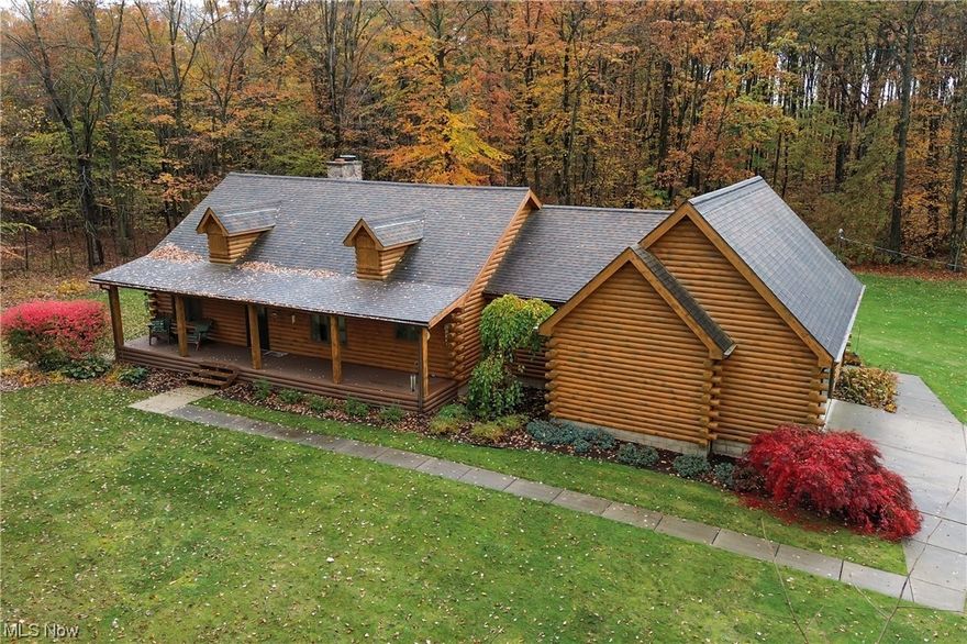 Welcome to your dream home nestled on 5.33 acres of pristine wooded land with city water and city sewer. This captivating 3-bedroom, 2-full bath, 1-half bath residence is a true masterpiece of modern living. With a spacious floor plan that seamlessly blends comfort, style, and natural beauty, this property offers an idyllic retreat for those seeking a serene and private lifestyle. The kitchen has ample counter space and cabinetry. The great room is a cozy retreat, featuring a beautiful fireplace as its centerpiece. With its open design, it's an inviting space for relaxation and entertainment. Sliding glass doors lead to an expansive outdoor deck, where you can soak in the beauty of your wooded oasis, perfect for morning coffee or evening cocktails. Upstairs, a loft awaits, offering versatile space for both work and leisure. This loft includes a well-appointed office area with built-in shelving and a sitting area that can be used as a reading nook or a place to unwind with a good book. The loft overlooks the great room, adding an open and airy feel to the home's design. The primary bedroom suite is a true sanctuary, complete with a spa-like en-suite bathroom and ample closet space. Two additional bedrooms are generously sized and share a well-appointed full bath. All bedrooms are designed with comfort and relaxation in mind, providing a peaceful retreat after a long day. Outside, the natural beauty of the 5.33 acres of wooded land is your private playground.