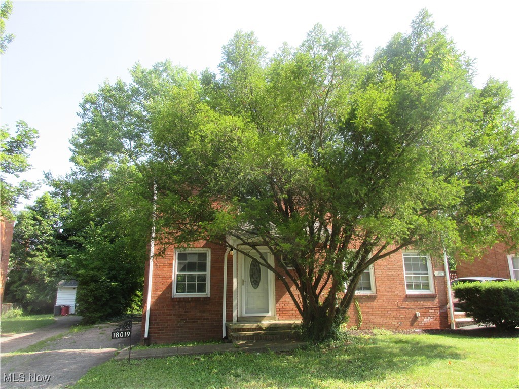 WOW, Shaker Hts at an affordable price. This brick, half duplex home offers two bedrooms, one full bath, living room, dining room, kitchen plus a full basement with an area for a rec-room and a utility room with a laundry facility. There is a full driveway and garage pad for ample off street parking. Being sold ‘as is’ but with your finishing touches this property will be a wonderful home.