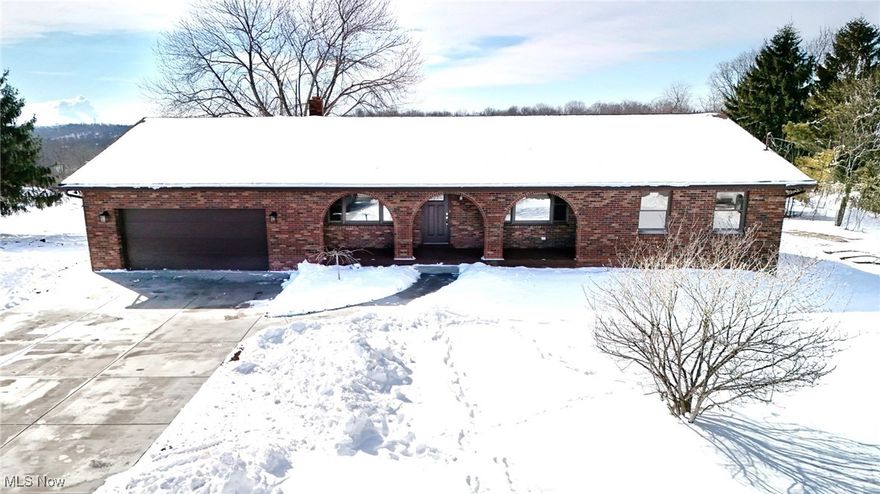 Stunning Remodeled Brick Ranch on 5 Acres with Barn & Mineral Rights! Welcome to this beautifully remodeled 2,035 sq ft brick ranch set on 5 picturesque acres, offering the perfect blend of modern updates and timeless charm. The entire main level has been renovated, featuring all-new flooring, fixtures, updated bathrooms, and gorgeous granite countertops throughout. This home offers 3 spacious bedrooms, including a private primary suite with a walk-in closet and updated en-suite bath. A stylish hall bathroom serves the additional bedrooms, while the basement includes a third full bathroom, ideal for guests or future finished living space. The kitchen shines with stainless steel appliances, new granite countertops, and ample workspace, flowing effortlessly into a formal dining room perfect for entertaining. The front living room overlooks the covered front porch with elegant archways, creating a welcoming first impression. A cozy family room with a decorative fireplace adds warmth and character. Step outside from the family room onto a brand-new deck overlooking the expansive backyard - perfect for relaxing or hosting gatherings. The property also includes an impressive 5,000 sq ft barn with stalls, ideal for horses, livestock, hobbies, or storage. 
Mineral rights convey, adding exceptional value to this already remarkable property. If you’re looking for space, style, and functionality with room to grow - this one checks every box.