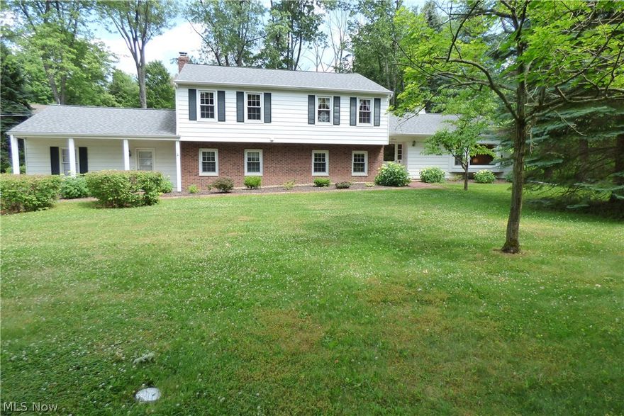 Location and convenience.  Don’t miss this Chagrin Falls Gem!  Spacious Rolling Ridge colonial. Very close to Chagrin Falls High School, restaurants, medical/dental, parks, and REC Center, and Performing Arts Center!  This 5 bedroom home features an open 1st floor plan with hardwood floors in the living room and dining room, a spacious freshly updated kitchen opening to the large family room with fireplace and adjoining sun room, as well as a 1st floor office or in-law/teen/guest suite with an adjoining full bath.  This room could be used as a 1st floor owner's suite.

The second floor features an owner’s suite and 3 additional large bedrooms.  The main bath features a Jacuzzi tub.  All bedrooms upstairs have oak floors and lighted ceiling fans, as well as ample closets.

Other amenities include zoned heating and air conditioning, newer roof/gutters/insulation, appliances, water system, hot water tank, and new flooring in the family room, laundry room, and first floor bath. Low uti