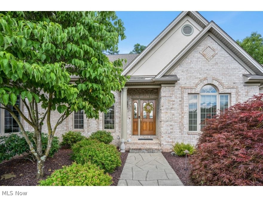 Dramatic 2464 square foot  all brick ranch in beautiful Villa Rosa Estates. Many wonderful quality features in this custom built home including three bedrooms and three and a half baths. Unique tray structured ceilings in several rooms. Wood, marble and tile flooring throughout with plenty of windows for natural sunlight. Also featuring formal dining room, office with built-in cabinetry, large family room with spectacular custom designed fireplace. Sliding doors to outside two tiered designed concrete patios. Large master bedroom includes beautiful bay window, walk-in closet with custom wood shelving. Master bath with walk-in shower plus granite top vanities. Jack and Jill bedrooms with own vanities and walk-in closets. Kitchen includes custom cabinets, over and under lighting plus Corian countertops and stainless steel appliances. Bay window featured in the dinette overlooking beautiful landscaped backyard. Spacious laundry room with wood cabinets and storage closet. Large finished ba