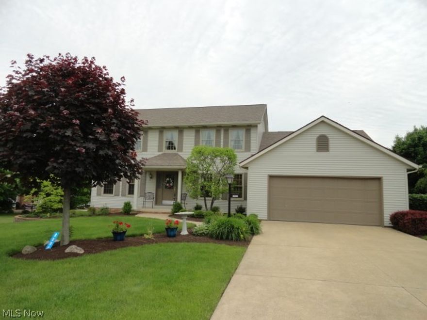 Beautiful neutral decor and nice open floor plan. Immaculately maintained and updated with new roof 2010, windows, tile flooring in Kitchen, Dinette, Laundry and Baths. New hardwood floors in 2010, carpet, water heater and more! Luxurious Master Suite, spacious rooms and mint condition throughout. See it today!