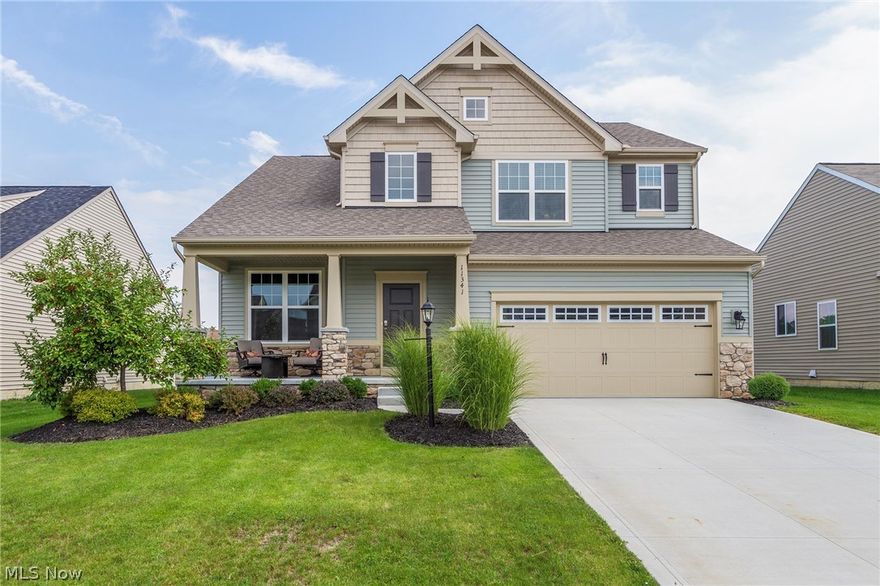 Why Build when you can move right into this 2015 Drees Homes Beautifully appointed in Columbia Reserve....This well appointed Home offers many upgrades including 9 foot ceilings, Barn Door accent & Garage bump out for your workshop or toys/motorcycle/ lawn equipment etc...  Geothermal heating and has proven savings to show you.... From the inviting porch to the electronic door lock opens to a Grand 2 story foyer, wood flooring throughout the main level...... You choose how to use the office/study/parlor or the Formal Dining room/Sun room, this flexible space increases possibilities.....The Family room/Great room boasts ample lighting for setting the mood in front of the gas fireplace & is open to the Gourmet Kitchen w/Extra long buffet area, Massive Center Island w/ Breakfast Bar all topped with Granite, Stainless appliances & 42" Timberlake Maple cabinets ...... Second Floor gives 4 large bedrooms with large closet areas, a Laundry & Full bath w/ceramic floors , a Super Sized Owner Su