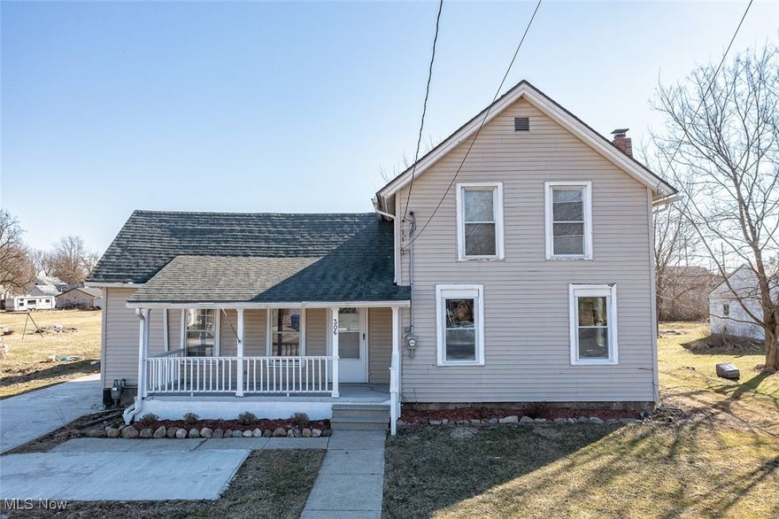 Welcome to 306 N Center, in the heart of Lagrange.  This home offers the best of both worlds, a quaint backyard and the convenience of walking into town center.  The current owner kept the charm of the 1830's with modern conveniences which is evident in the reuse of the old barn material to create barn doors into the first floor owners suite.  The quaint kitchen has carefully preserved the metal sink, gas heater/fireplace and corner pantry with subtle modern upgrades to transition to butcher block counters and a new gas stove.  Through the kitchen is a large dining room with beautiful hardwood floor.  The large family room includes a gas fireplace that holds true to the charm of the home while offering modern conveniences.  Upstairs offers 2 addition bedrooms, one that is rather sizeable.  The main floor laundry room escorts you to the new 10x12 deck, great for entertaining.  This owner understands the need for new garage and built a brand new oversized 1 car garage with a freshly poured driveway with turnaround pad.  The basement has been substantially improved with the work completed, including: waterproofed, tuckpointed and dry-locked.  Electrical has been updated.  Seller has window units that will convey with the home. Welcome home!