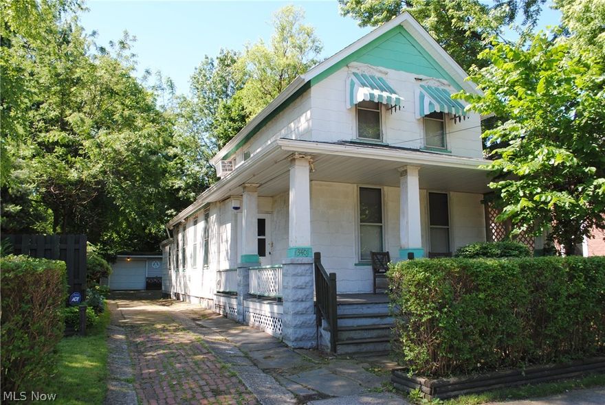 Charming Colonial home on a private, double lot offers a great opportunity.  Warm parlor room to greet your guests.  Formal living and dining rooms.  Updated kitchen with oak cabinets.  1st floor bedroom.  1st floor laundry.  Large 1st floor full bath.  Master bedroom is the entire 2nd floor offering walk in closet and full bathroom.  Newer roof.  2nd lot next door has it’s own parcel number and offers a wonderful, private yard… must see to appreciate.  1.5 car garage.  Shed provides more storage.  Great location minutes from Ohio City and Tremont.  Call today.