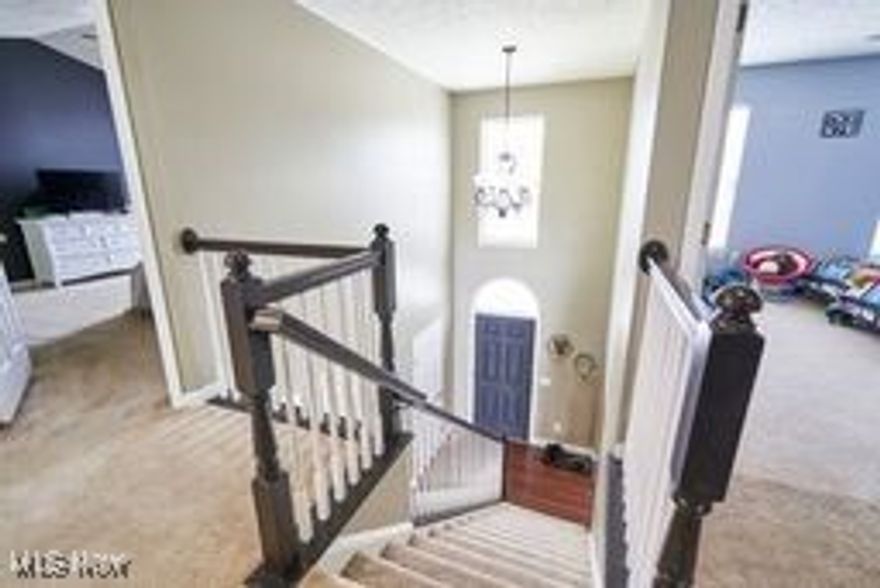 Meadow Lakes Colonial with 2328 sqft plus a finished basement with 700 sqft. Bamboo flooring throughout the first floor. Expresso kitchen cabinets with an off white island with a veggie sink and granite counter top. The kitchen flows to the family room which has  an office space with double doors. A formal dining room off the entry way, a half bath and a first floor laundry finish the first floor. A large owners suite with vaulted ceilings and three generous sized bedrooms and guest bath finish the second level. The finished lower level with LVP flooring and neutral tones gives you 700 more sqft to roam. The basement also boasts a half bath that is plumbed for a full bath. The large fenced yard with a concrete patio give plenty of space in the summer. AC unit 2023. Close to shopping and freeways.