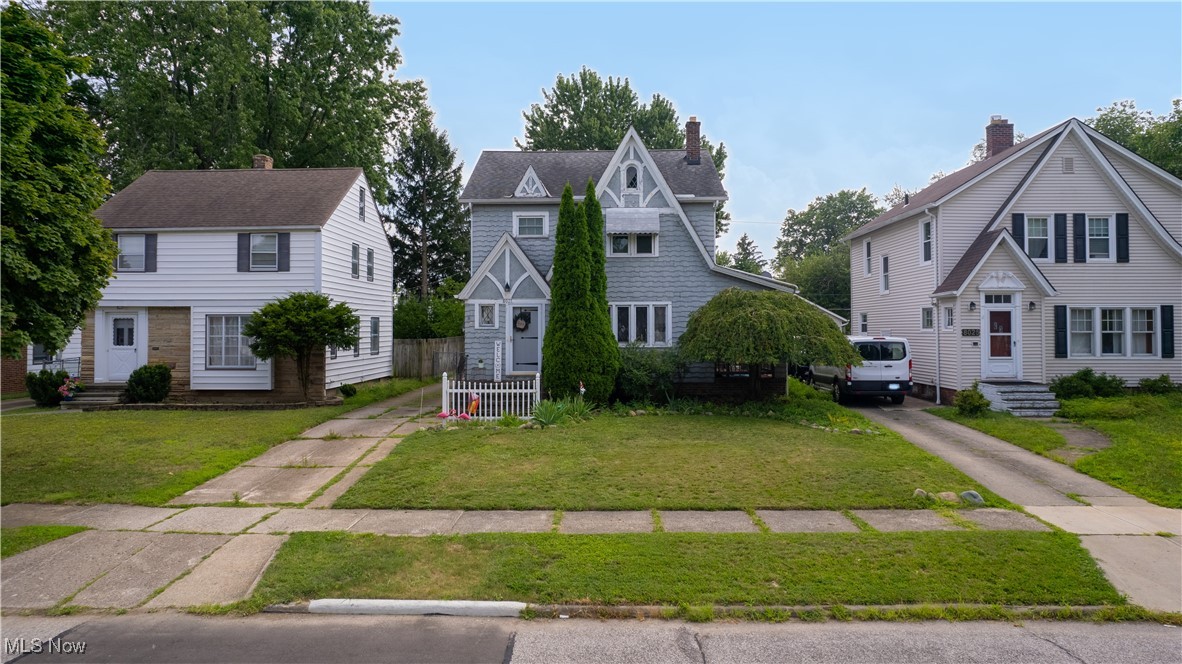 Discover the timeless character of this 1930 Tudor home featuring 3 bedrooms, 2 full baths, and 1,688 sq. ft. of living space, plus a partially finished 840 sq. ft. in the basement for even more room to enjoy. The main level offers a warm and welcoming living room with custom built-ins and a decorative fireplace, a formal dining room with charming built-ins and access to your covered side porch - to enjoy your morning coffee, and an updated kitchen with all appliances included—perfect for both everyday living and entertaining.
Upstairs, you’ll find three spacious bedrooms and a full bath, along with a walk-up attic that can easily be finished for additional living space. The basement expands your options with a large recreation room, second full bath, plenty of storage, and a laundry area.
Recent updates add peace of mind, including a new back door (2024), new furnace (2022) and an updated electric panel.
Outside, enjoy your fenced-in backyard perfect for family gatherings or enjoying watching the children play or garden - the possibilities are endless! Full of character, updates, and room to grow, this Tudor blends classic charm with modern convenience—ready to welcome you home! There is a 2 car detached garage but it's in need of repair.