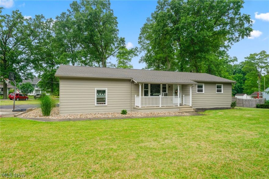 This Superb ranch home in the Canfield Schools District is ready and waiting! It rests three bedrooms, full bath and an extensive list of improvements and updates throughout, which the owners have made over the last several years. Also, there's an oversize bonus room--with abundant heated space and potential for recreation/gaming area, a playroom, home gym, workshop, family room, or whatever else you might envision to make it your own!

Newer vinyl plank flooring flows seamlessly throughout kitchen, living room, dining area, and bedrooms. The living room and all bedrooms have stylish matching ceiling fans for added comfort. Modernized bathroom hosts a beautiful double-basin vanity and tub/shower combo. Laundry is in the big, clean, dry basement. Home includes a radon mitigation system for peace-of-mind.

Outside, this 3/4-acre property includes a separate storage shed in addition to the convenient two-bay attached garage, plus a backyard greenhouse to bring out the green thumb in you!

When desirable location, outstanding condition, updated features, and price-value meet, ranch homes usually sell quickly, so act fast.  See this home today, then maybe call it home tomorrow!