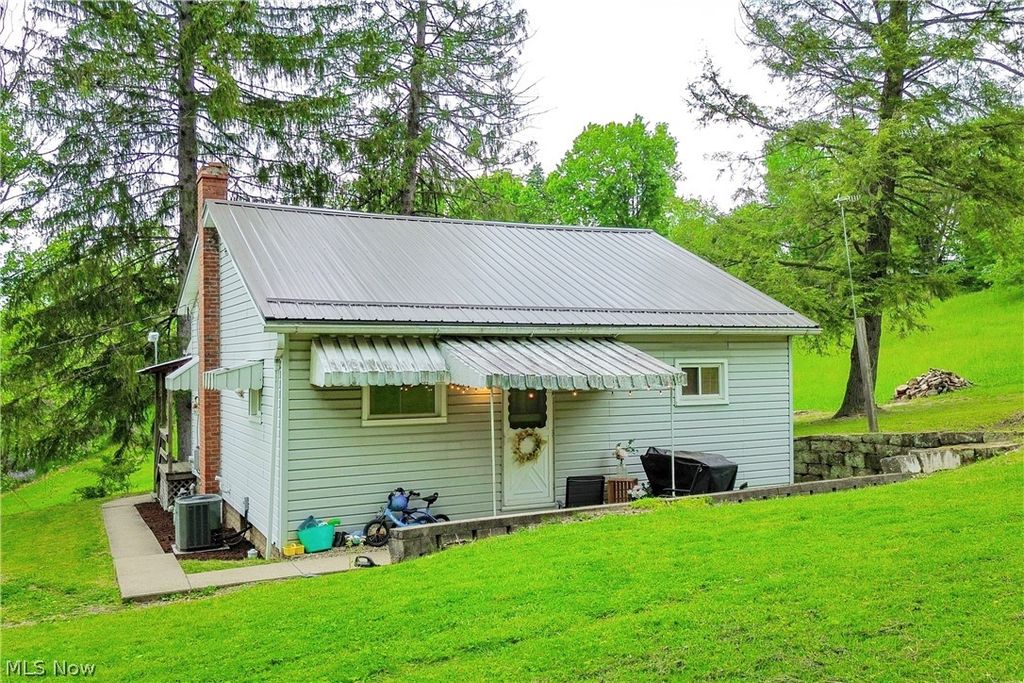 Photo of 136 E Wheeling Street, Cadiz, OH 43907 (MLS # 5212219)