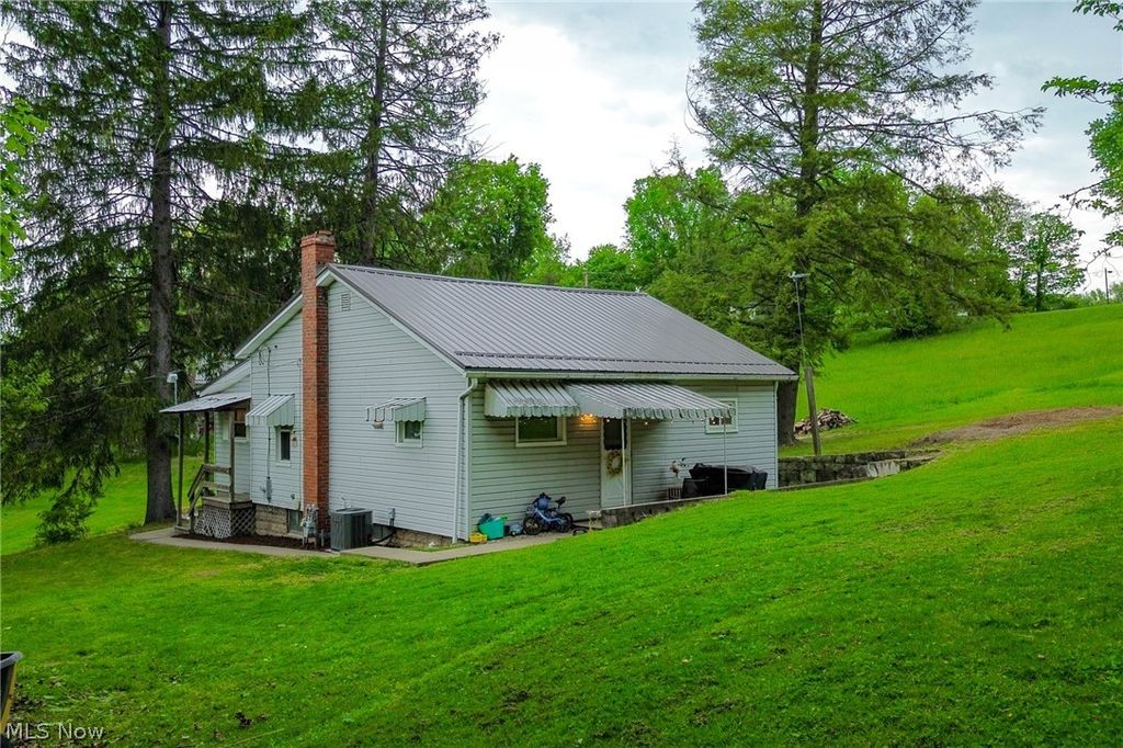 Photo of 136 E Wheeling Street, Cadiz, OH 43907 (MLS # 5212219)